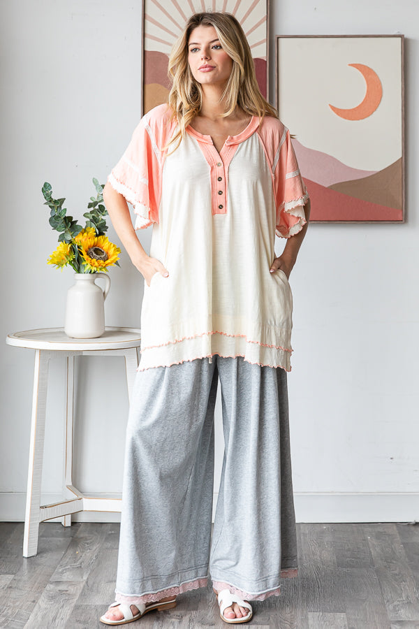 WASHED OVERSIZED WAVY HEM BUTTONED V NECK SHORT SLEEVE TOP