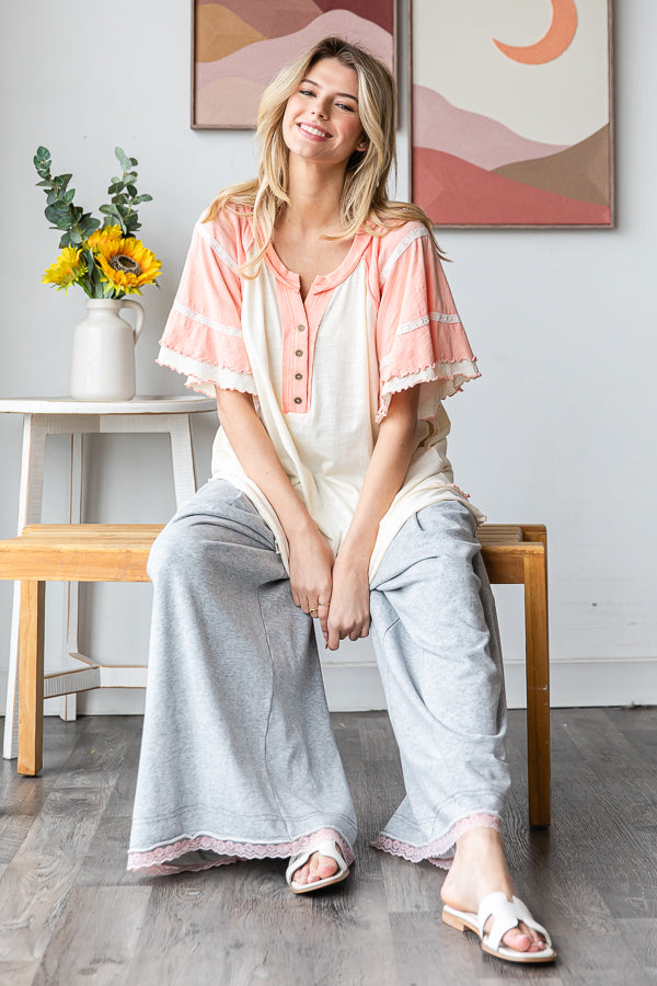 WASHED OVERSIZED WAVY HEM BUTTONED V NECK SHORT SLEEVE TOP