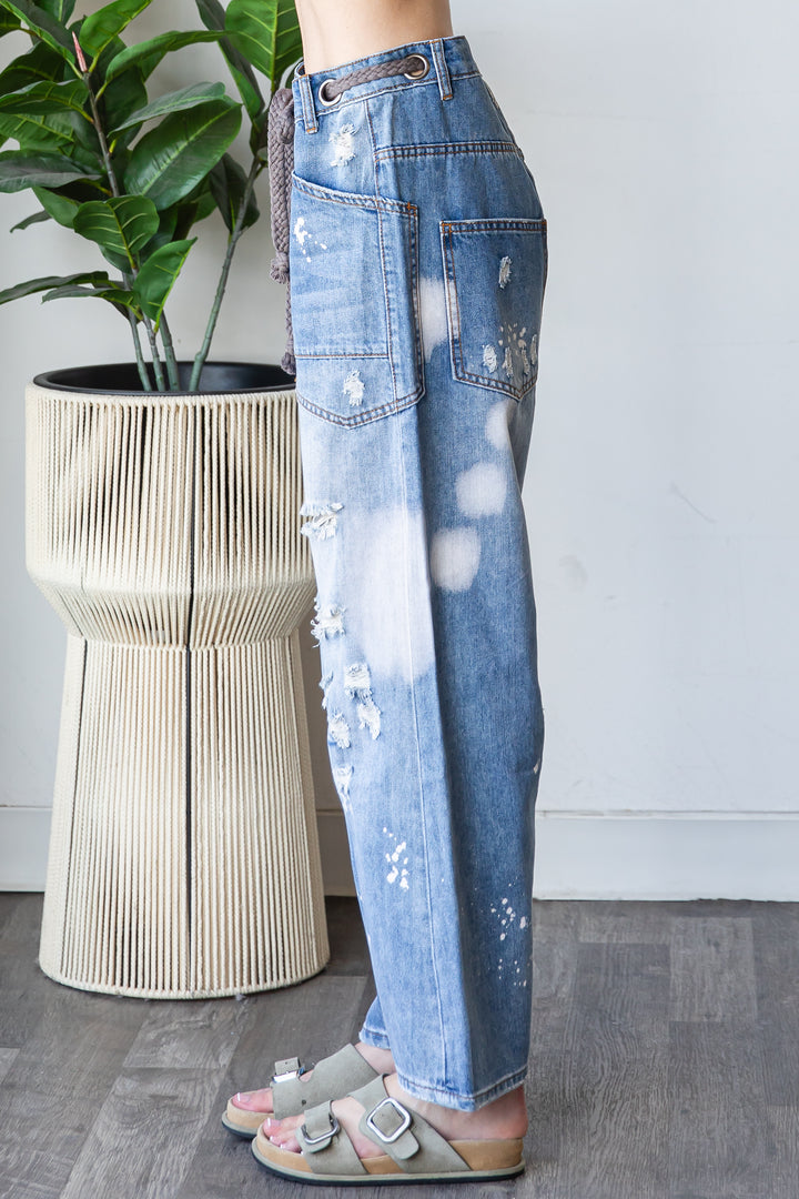 WASHED DRAWSTRING WAIST DISTRESSED DENIM JEANS