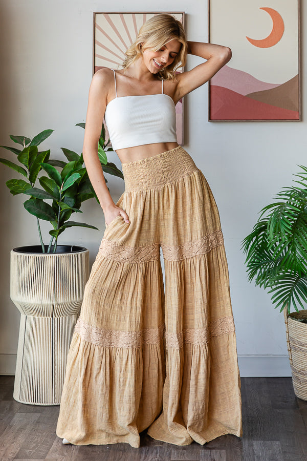 WASHED SMOCKED WAIST TIERED WIDE LEG FLARE PANTS