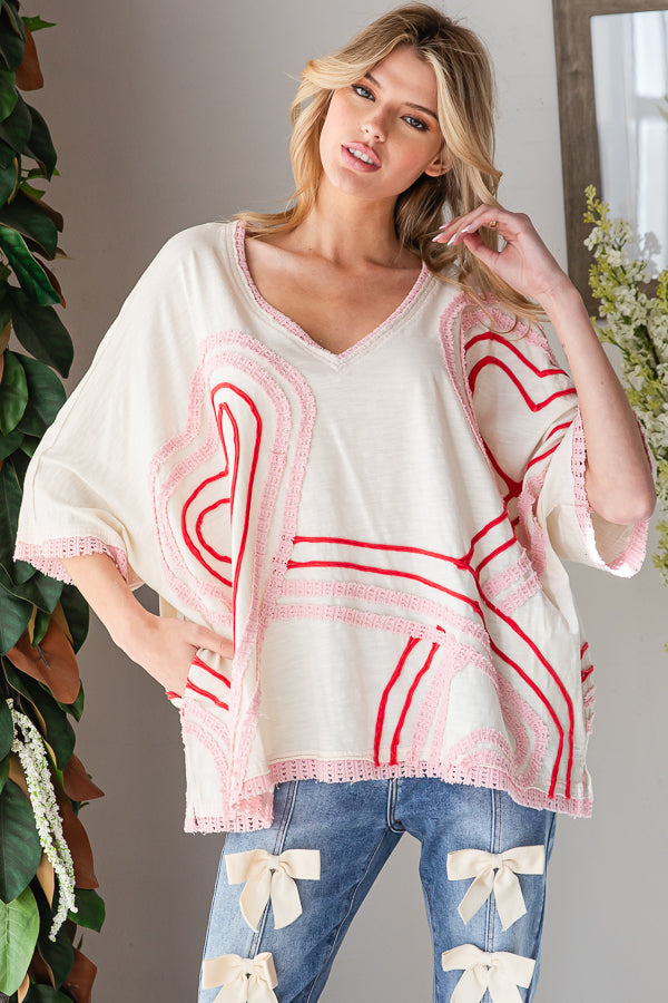 WASHED CONNECTIVE HEARTS V NECK TOP
