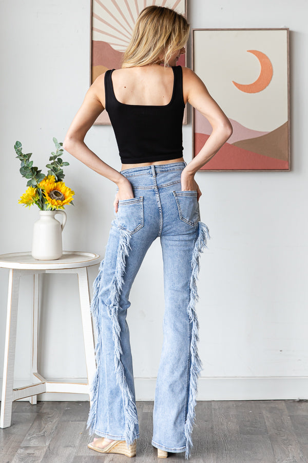 MEDIUM LIGHT WASH FRAYED STRETCH FLARE DENIM JEANS