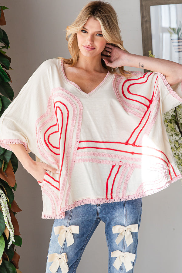 WASHED CONNECTIVE HEARTS V NECK TOP