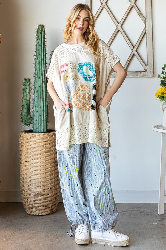 EMBROIDERED YOKE FLOWER APPLIQUE TOP