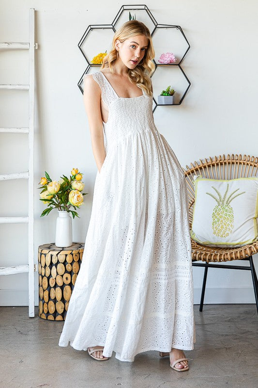 WASHED SMOCKED EYELET SLEEVELESS WIDE LEG JUMPSUIT