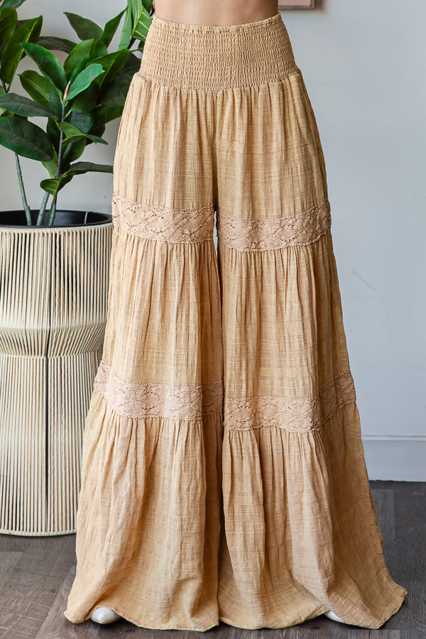 WASHED SMOCKED WAIST TIERED WIDE LEG FLARE PANTS