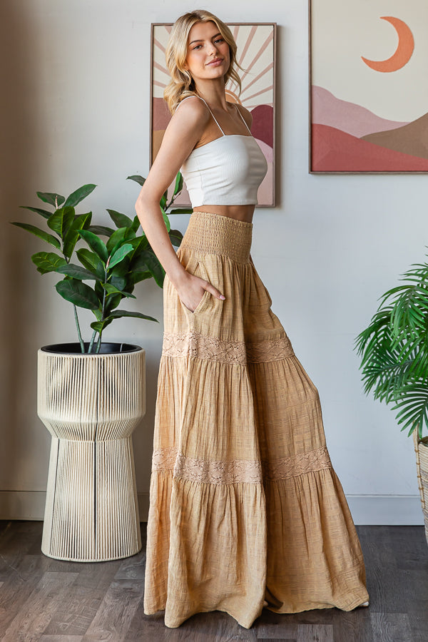 WASHED SMOCKED WAIST TIERED WIDE LEG FLARE PANTS