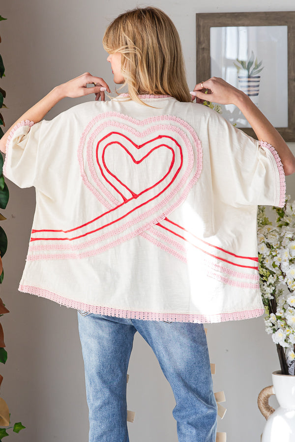WASHED CONNECTIVE HEARTS V NECK TOP