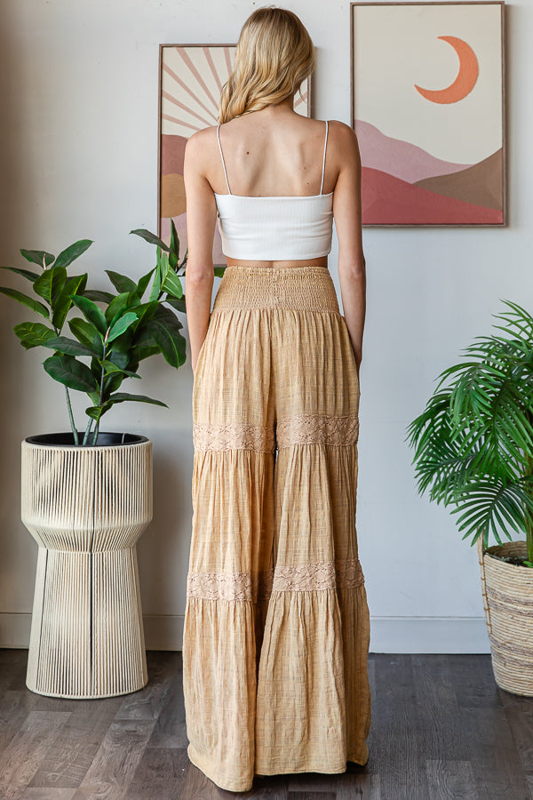 WASHED SMOCKED WAIST TIERED WIDE LEG FLARE PANTS